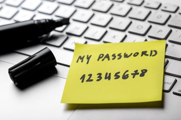 sticky-note-with-weak-easy-password-on-laptop-keyboard-898320664_2125x1416